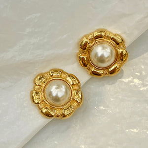 Gold rimmed pearl earrings