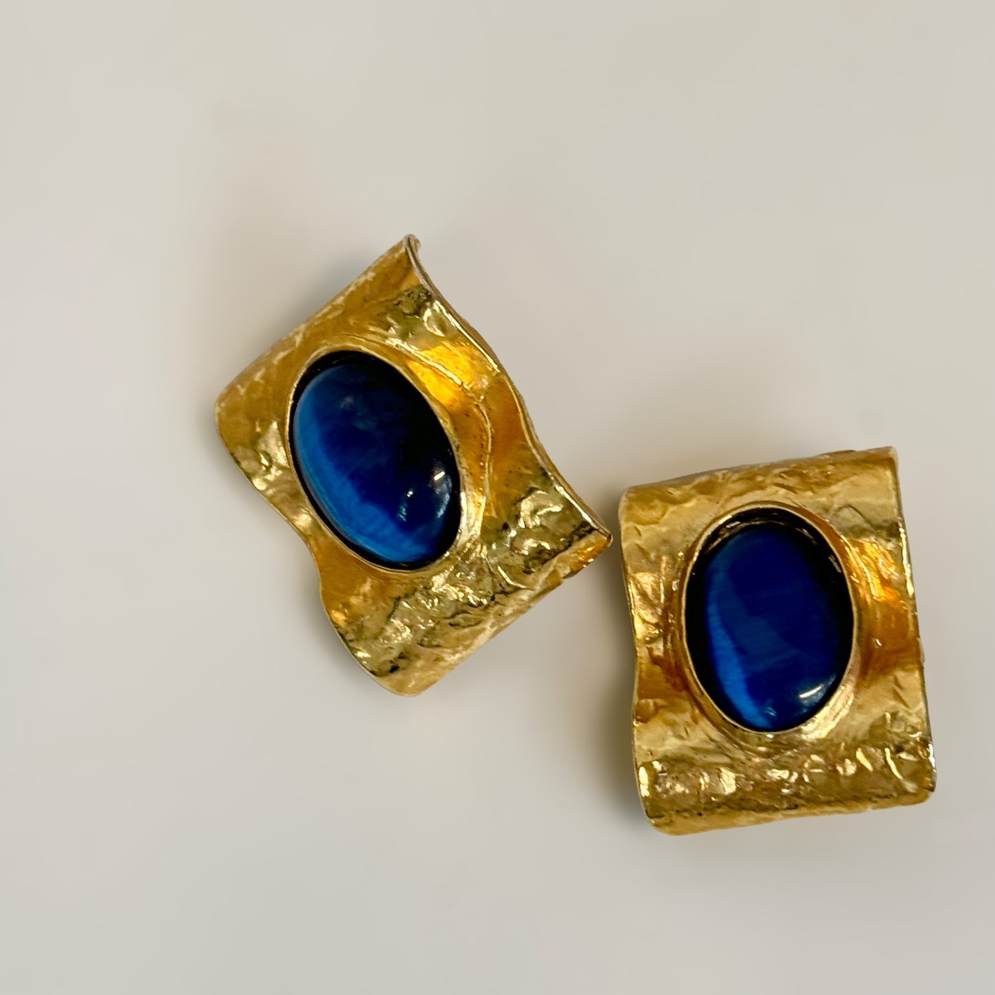 Stunning golden paper blue cabochon earrings