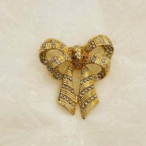 Gold and silver knot brooch