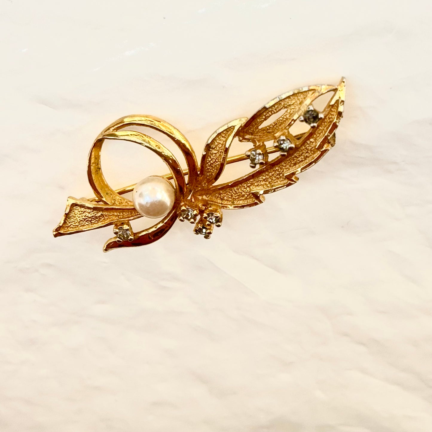 Small floral brooch one pearl