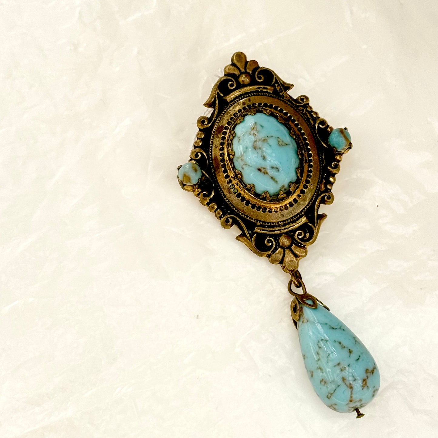 Old blue brooch with dangle, natural stone