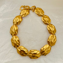 Load the image in the gallery, Sublime Yves Saint Laurent matte gold necklace with iconic heart clasp