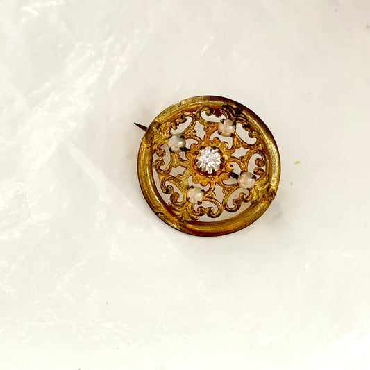 Old round brooch arabesques diamonds and pearls