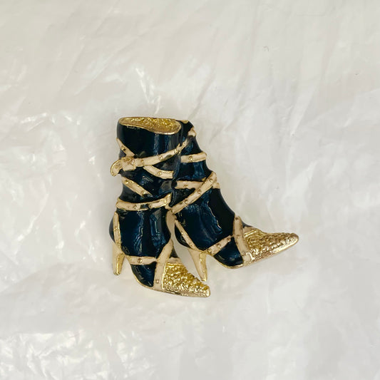 Broche bottes