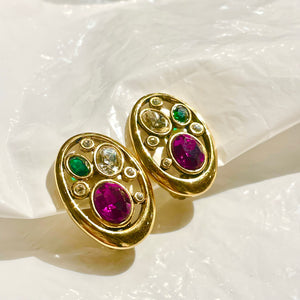 Treasure of openwork oval earrings with colored diamonds