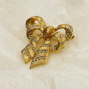 Gold and silver knot brooch