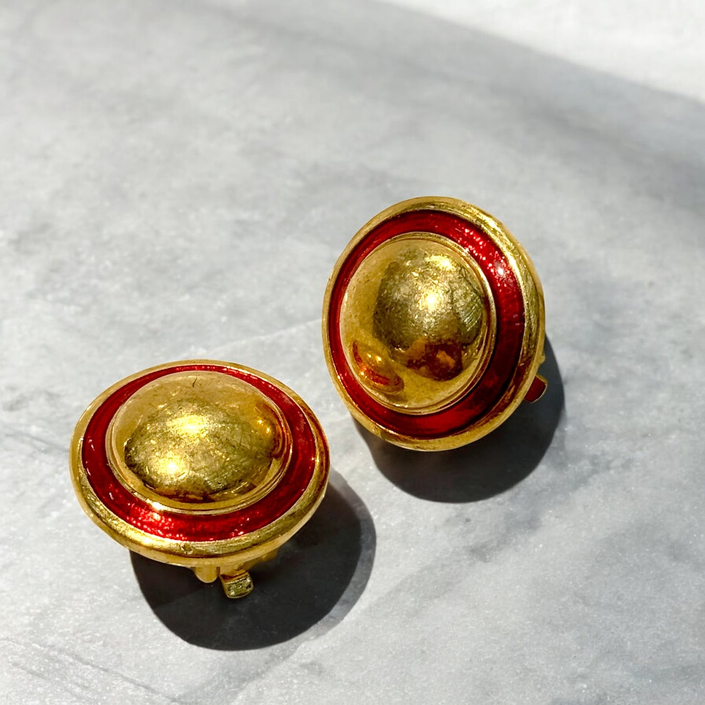 Beautiful round golden earrings red enamel