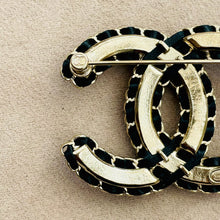 Load the image in the gallery, Chanel black laced leather brooch