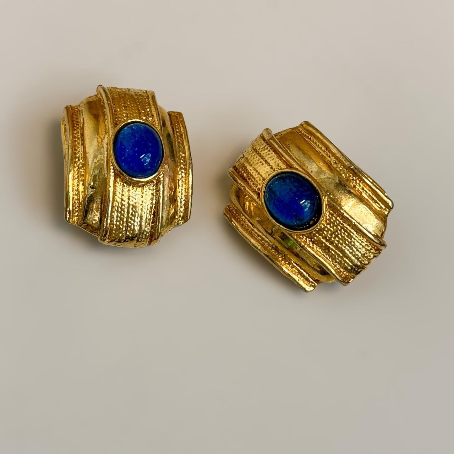 Stunning golden earrings blue cabochon