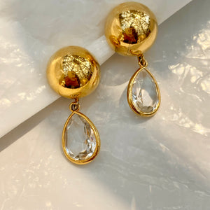 Wonders of golden round couture earrings with diamond teardrop tassel