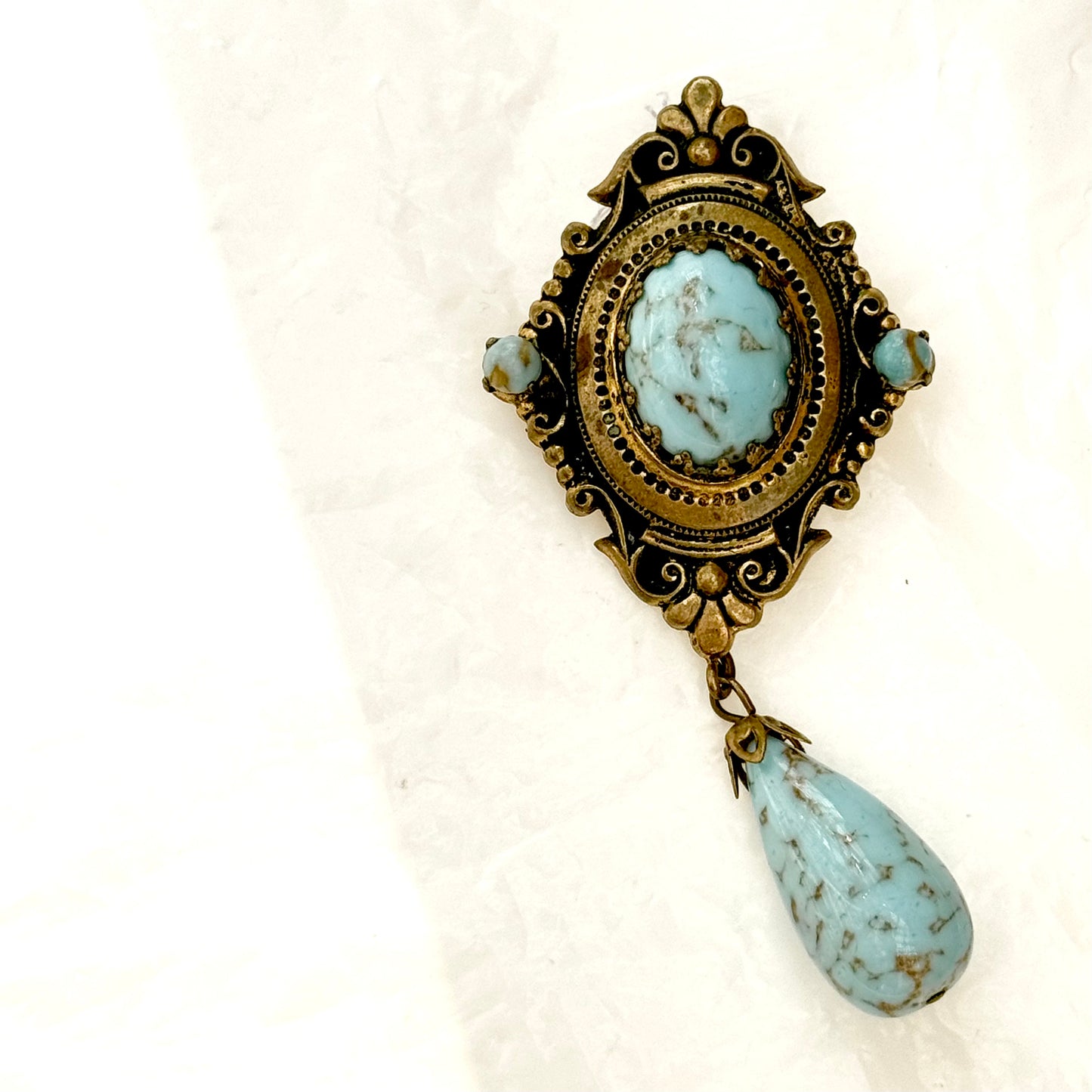 Old blue brooch with dangle, natural stone