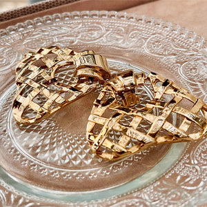 Imposing dangling golden earrings with openwork grid
