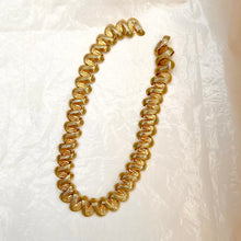 Load image into Gallery viewer, Perfectly patinated golden wave necklace