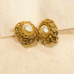Oval white pearl earrings with gold curb chain