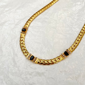 Sublime shiny snake mesh necklace with three midnight blue diamonds