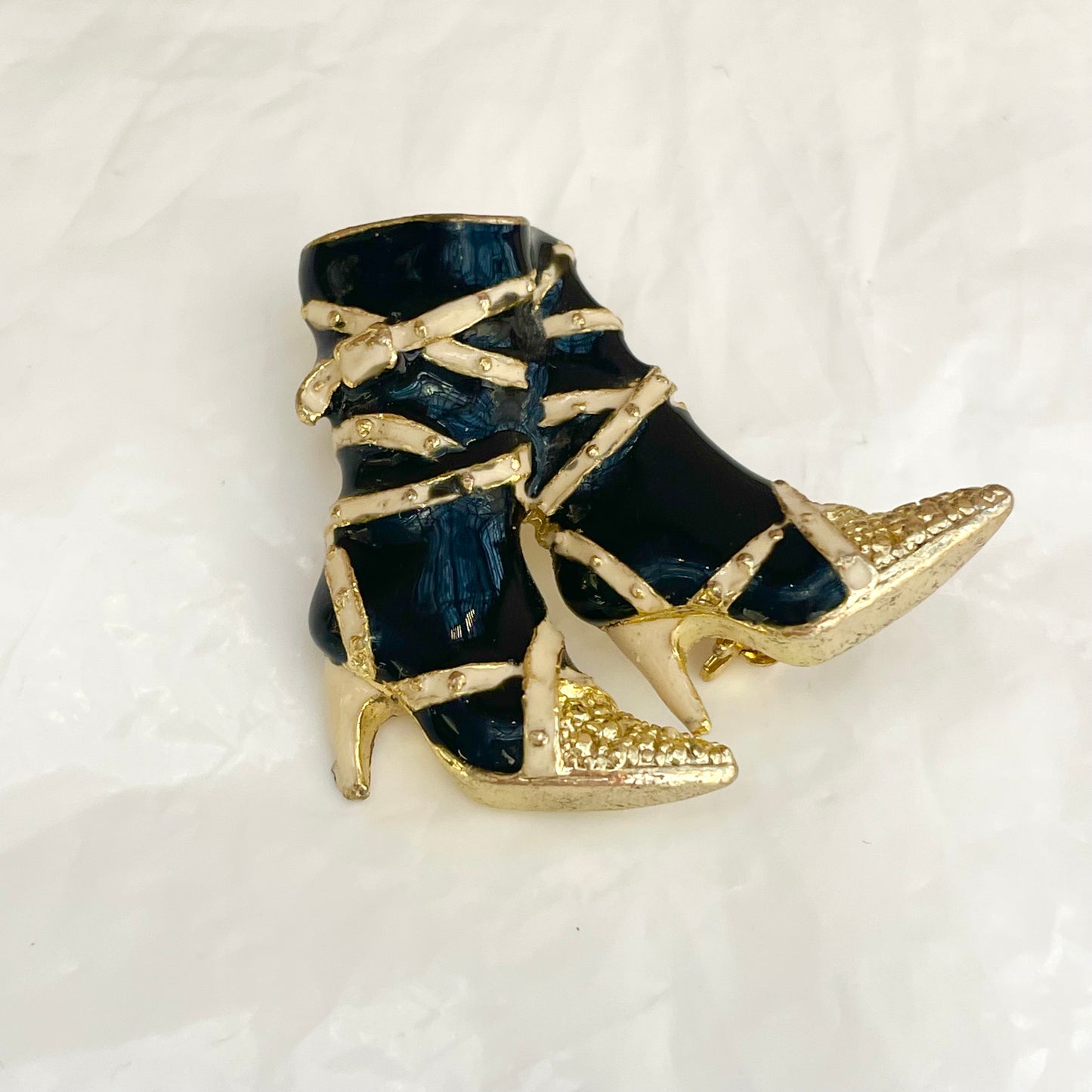 Broche bottes