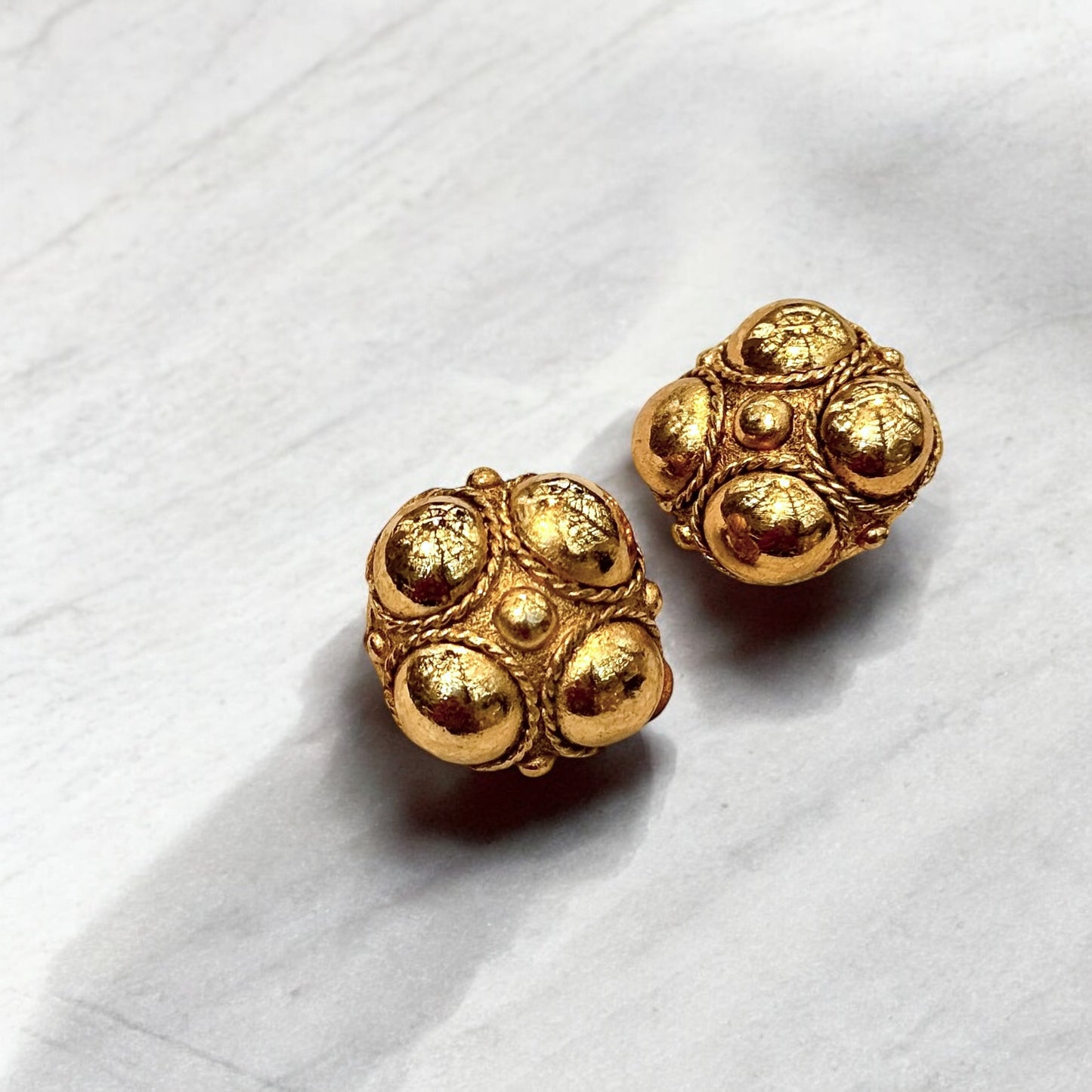 Beautiful round golden earrings