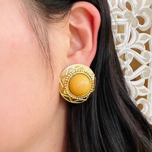 Cream bead earrings circled in gold with ball and star details
