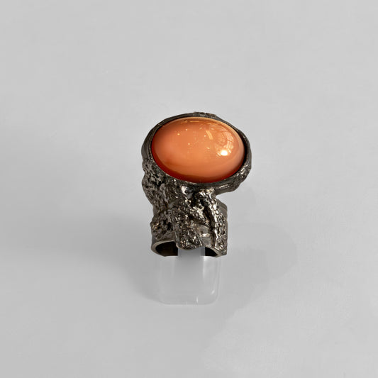 Wow-worhy Yves Saint Laurent silver and pink ring