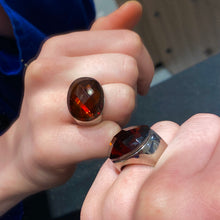 Load the image in the gallery, Silver metal tank ring with faceted oval amber stone