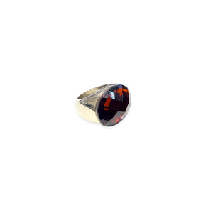 Silver metal tank ring with faceted oval amber stone