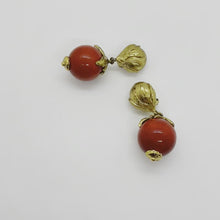 Load and play the video in the gallery viewer, Yves Saint Laurent vintage gold and red earrings from GIGI PARIS