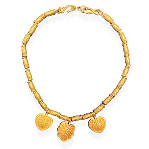 Golden necklace with long floral beads