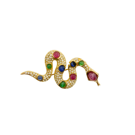 Broche Christian Dior dorée serpent cabochons verts bleus et roses vintage de chez GIGI PARIS