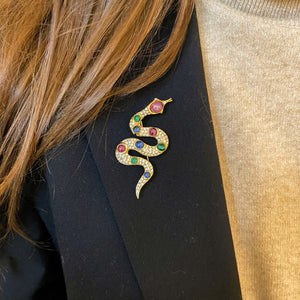Broche Christian Dior dorée serpent cabochons verts bleus et roses vintage de chez GIGI PARIS
