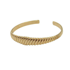 Rose gold-plated bangle domed in the center and vintage striped from GIGI PARIS