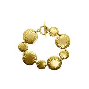 Bracelet Soleiado doré mat soleils sur cercles fermoir TO  vintage de chez GIGI PARIS