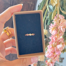 Load image into Gallery viewer, Interlaced gold-plated ring with 2 pink stones and a vintage white stone from GIGI PARIS