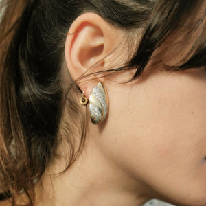 Gold and glitter swirl oval earrings