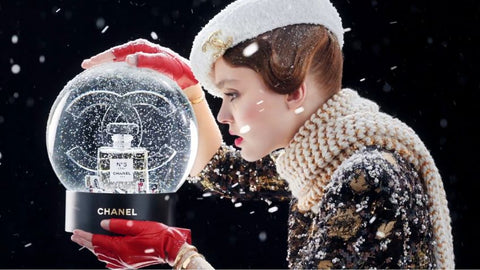 Jewel brooch on beret advertising Chanel